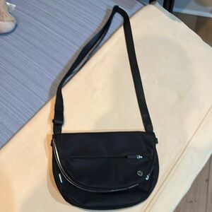 Black nylon crossbody bag.